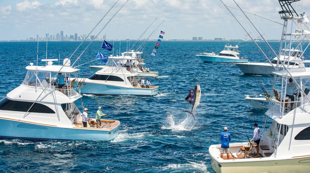 Sailfish leaping beside a sportfishing boat during the Quest for the Crest tournament off Fort Lauderdale