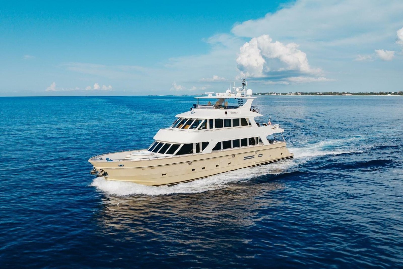 Aurelia, a 2007 President 87 tri-deck motor yacht listed by Luke Brown Yachts, running offshore